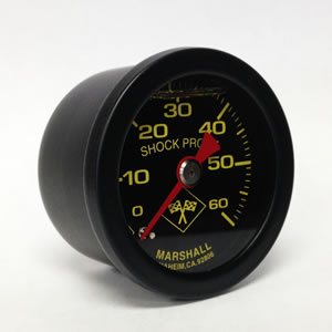 Marshall black liquid filled oil PSI gauge 0-60 PSI with yellow markings and stainless steel case