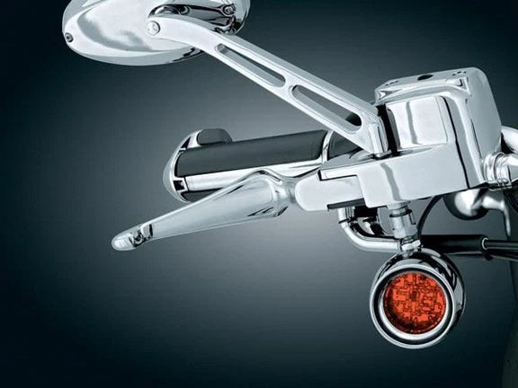 Kuryakyn 1038 chrome Boss Blades installed on Harley-Davidson frame